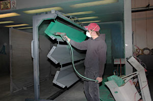 Powder coating over stainless steel and metals