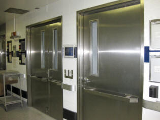 Specialty Welding & Fabricating  of NY manufacturers stainless steel doors and cabinets for pharmaceutical, food processing and cleanroom environments